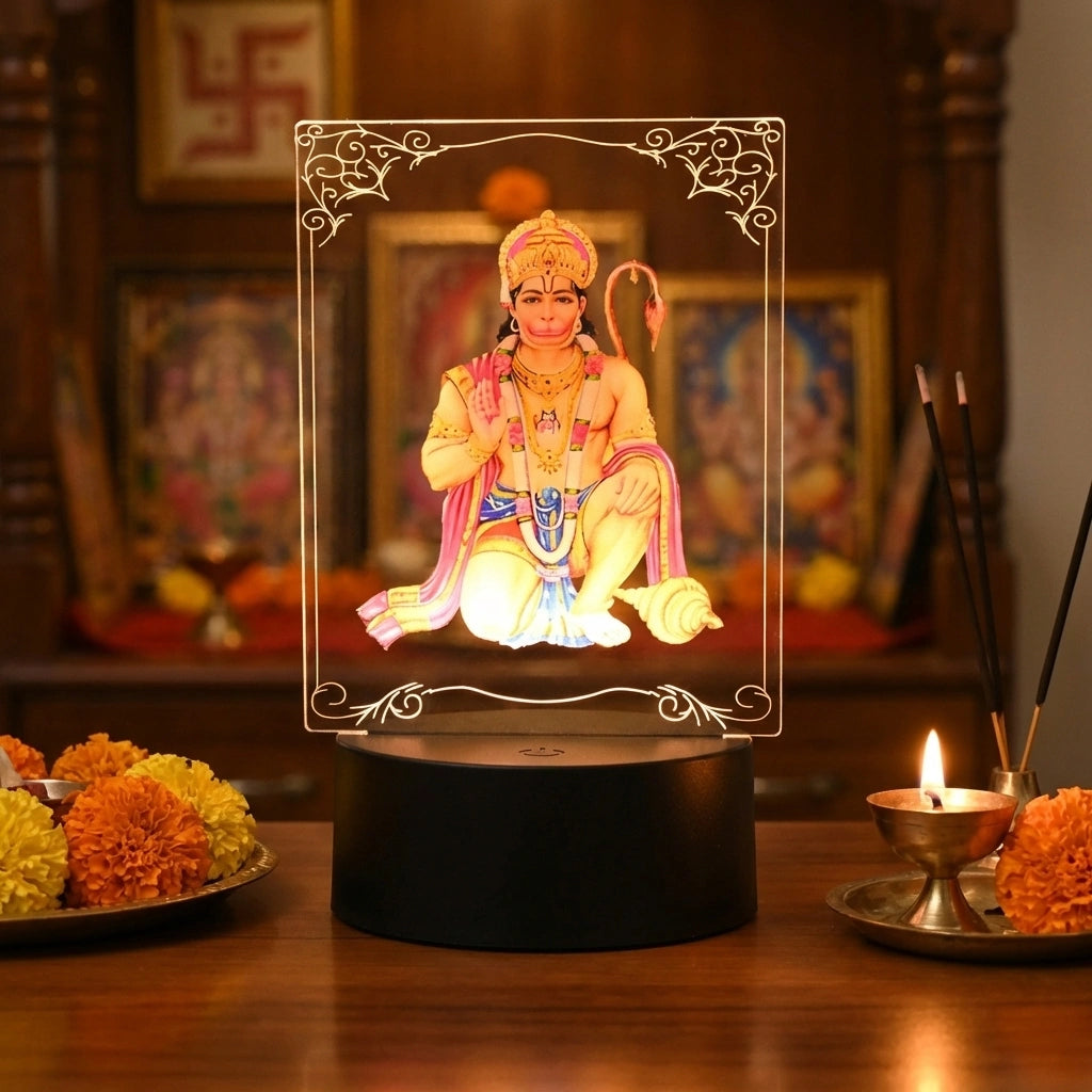 Hanuman LED lamp with glowing seated deity figure in decorative glass dome, black base
