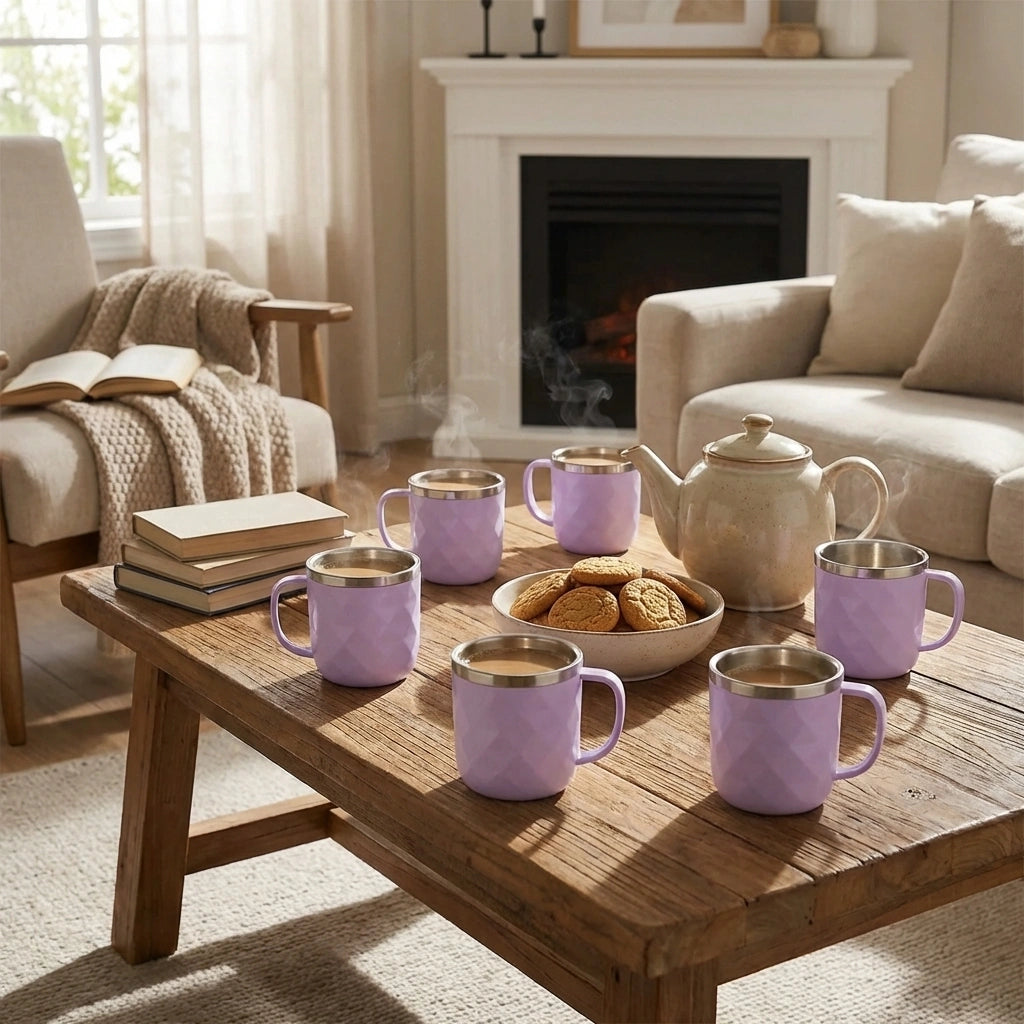 Lavender ceramic tea cup set with gold rims, matching teapot and cups