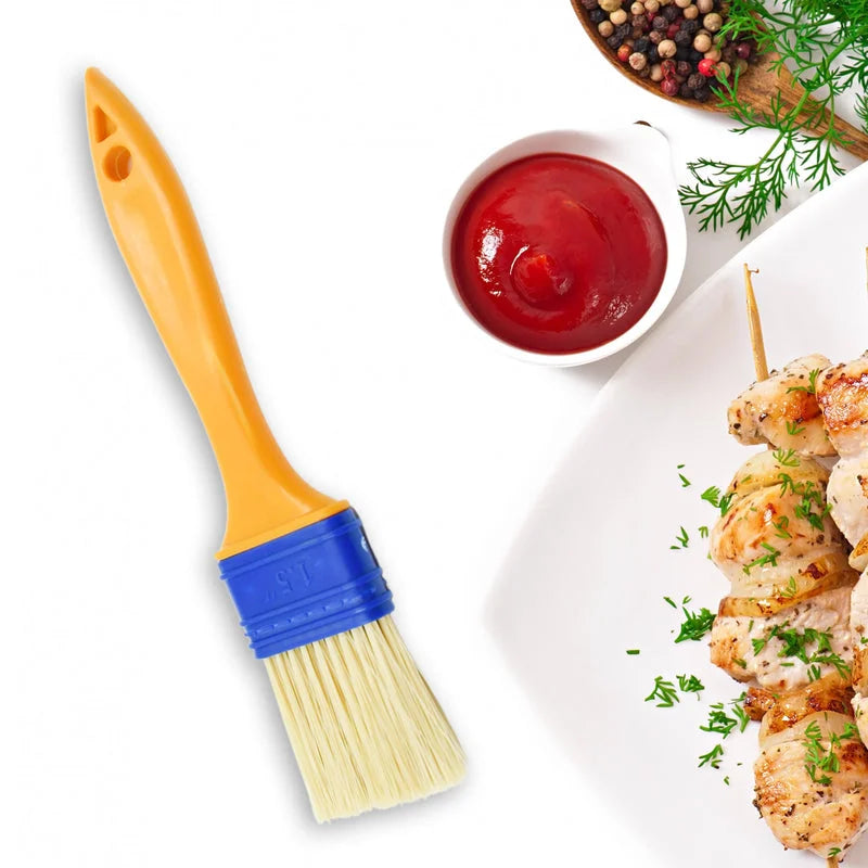 2-in-1 pastry brush with yellow handle, blue ferrule, and light bristles