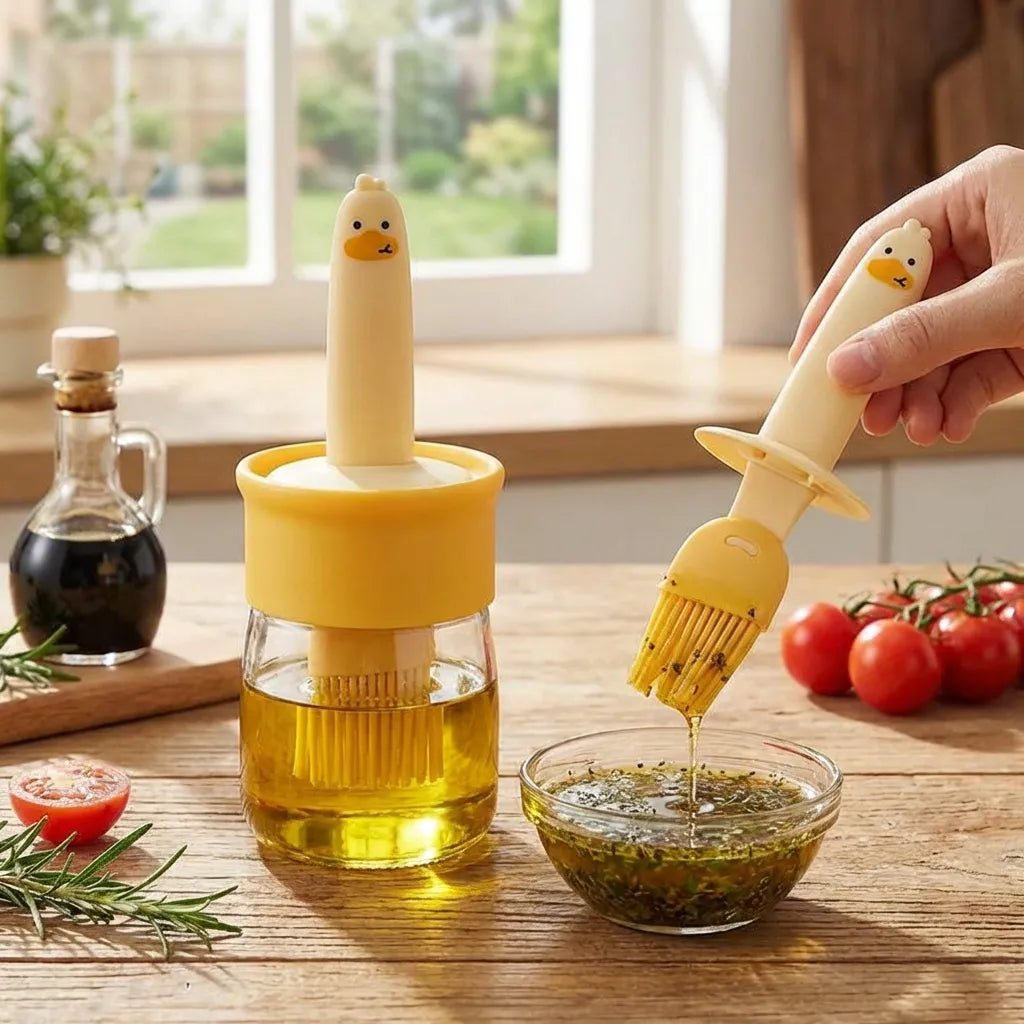 2-in-1 oil dispenser with yellow container and brush spout in hand