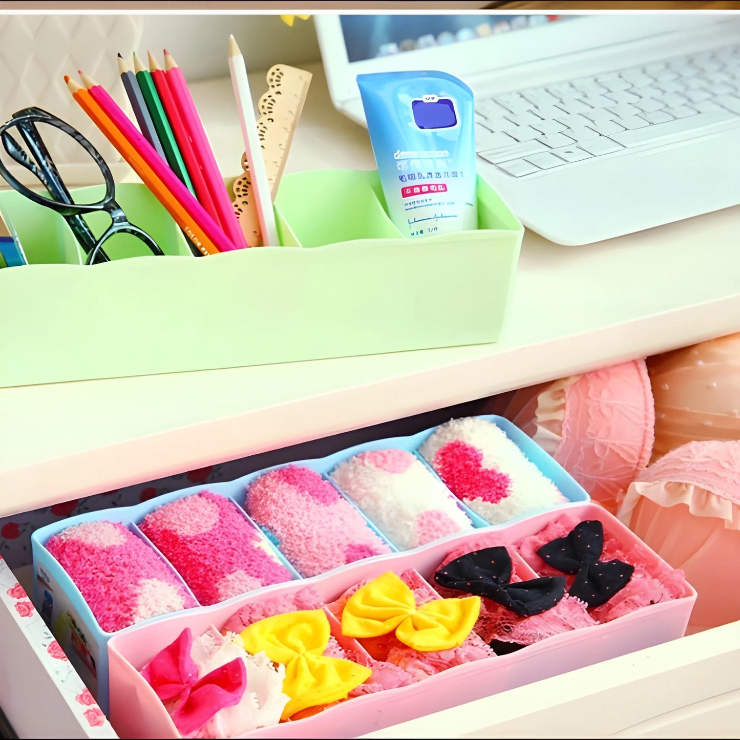 5-compartment drawer organizer with pink dividers, open top and separated compartments