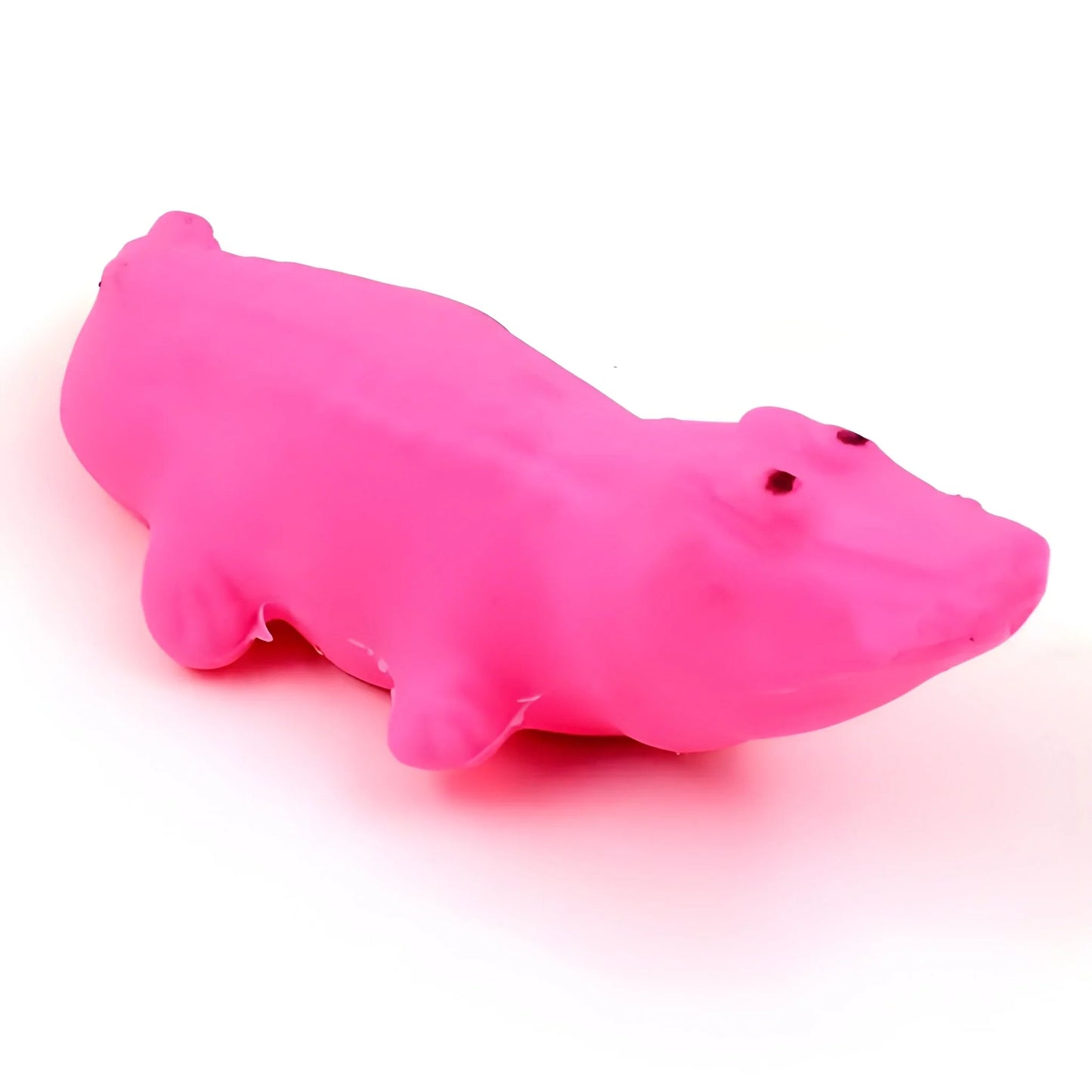 Pink shark-shaped eraser with rounded fins and small detail holes