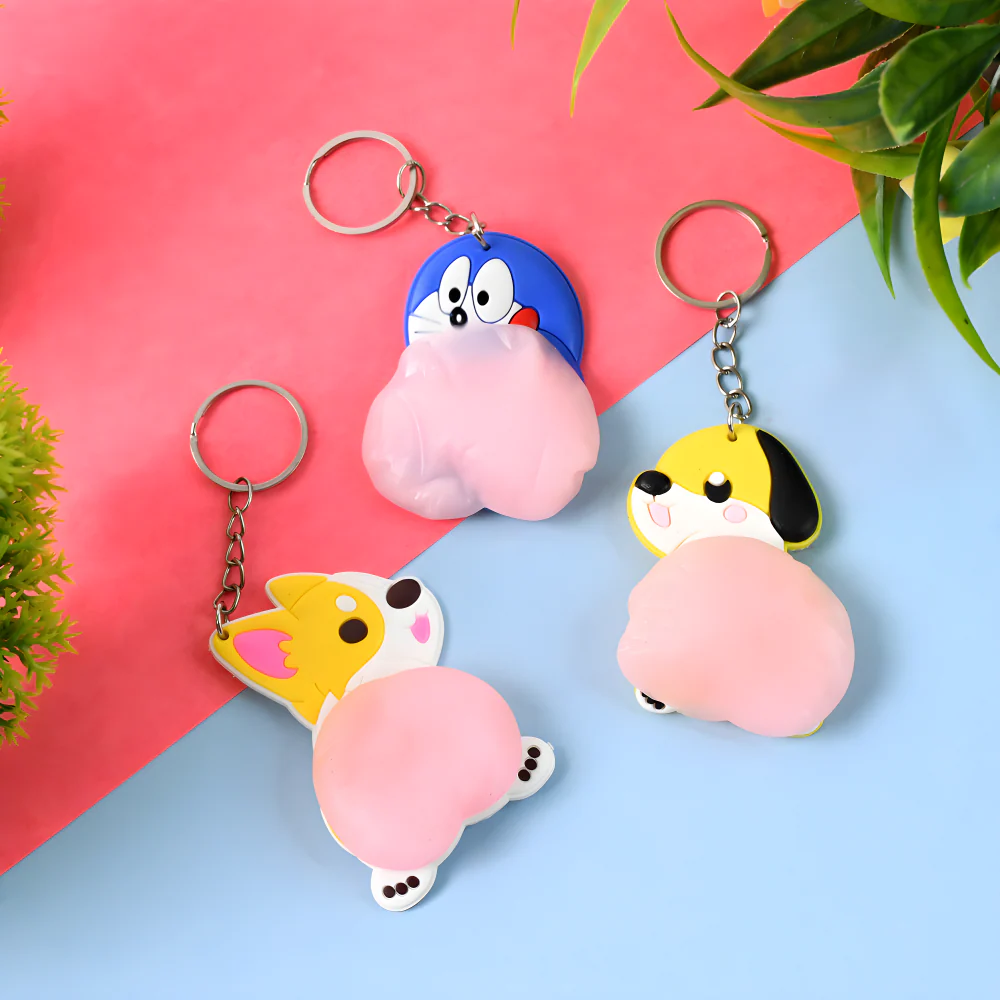 Animal squeeze keychain toys with pink squishy animal shapes and metal key rings