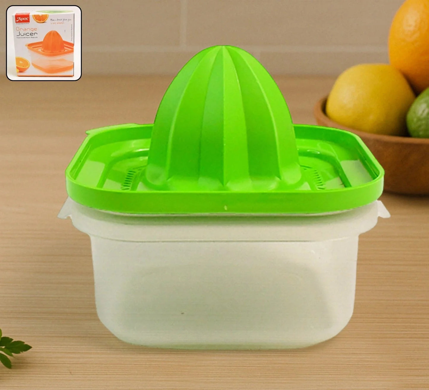 Manual orange juicer with green reamer and clear white catch cup
