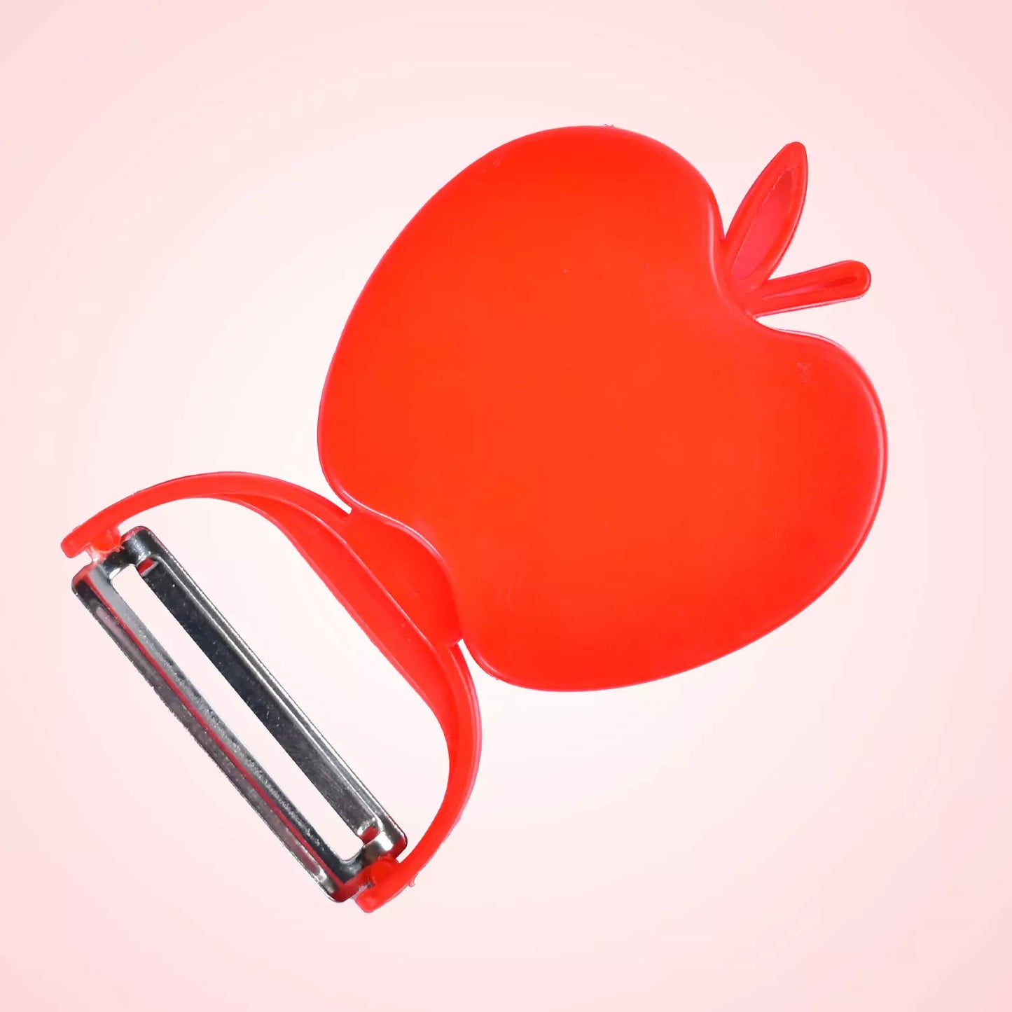 Apple-shaped folding peeler, red plastic with fold-out stainless blade