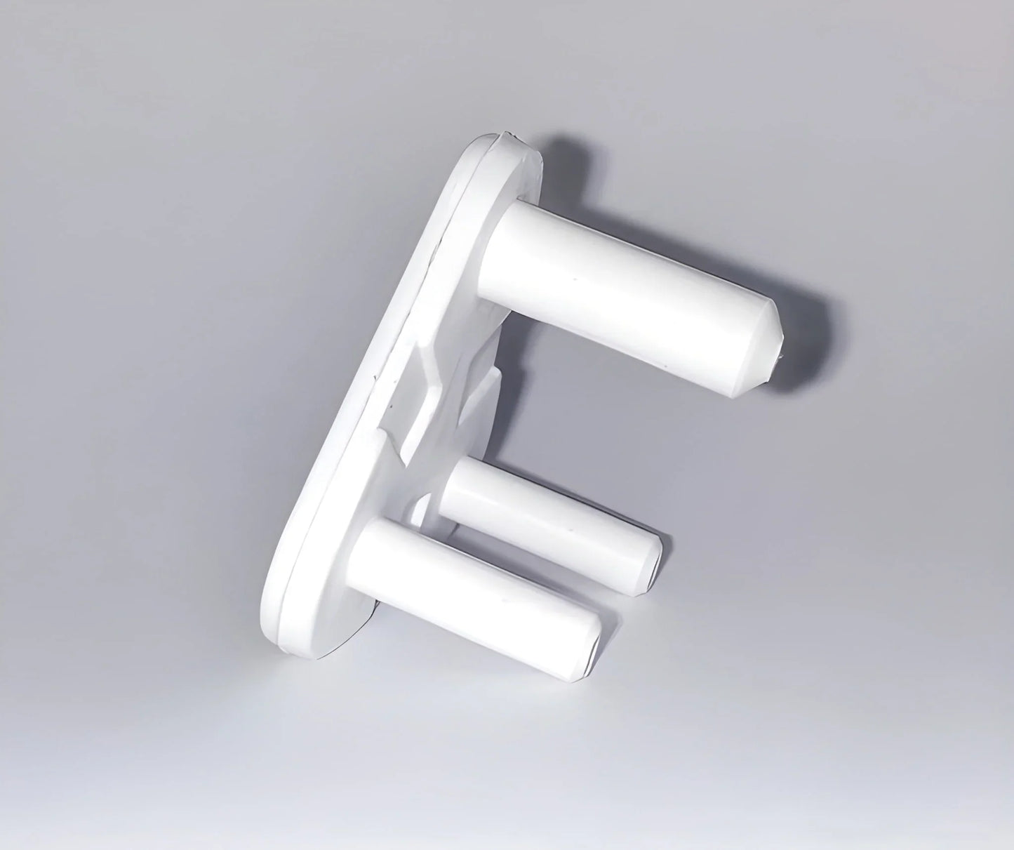 White baby socket safety covers with two prongs