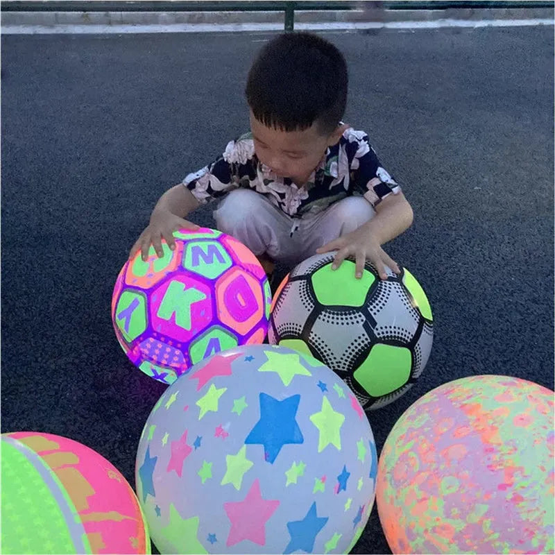Colorful bouncy rubber balls for kids, star and neon patterns with green soccer ball