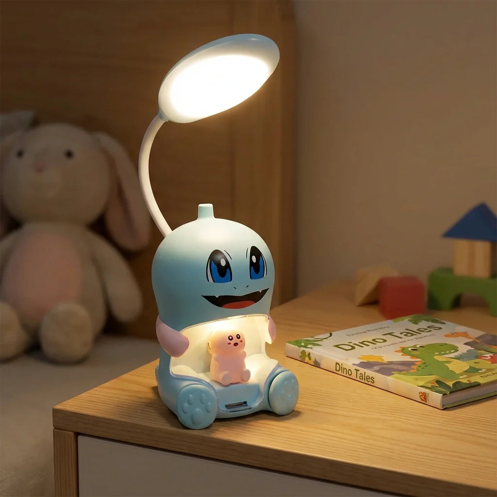 Cartoon LED desk lamp with blue character face, white rounded shade, small figurine base