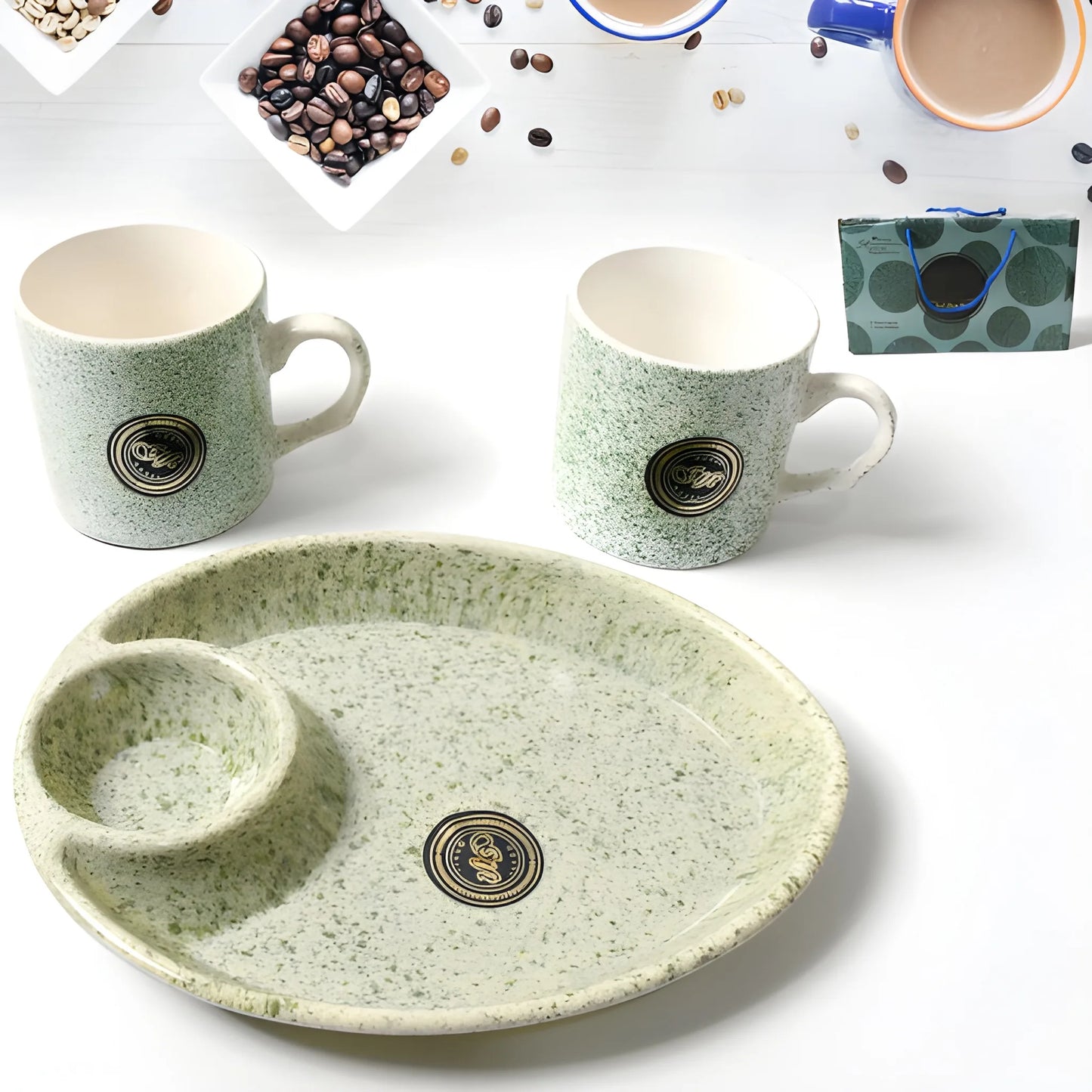 Speckled green ceramic cup set with round platter and two logo mugs