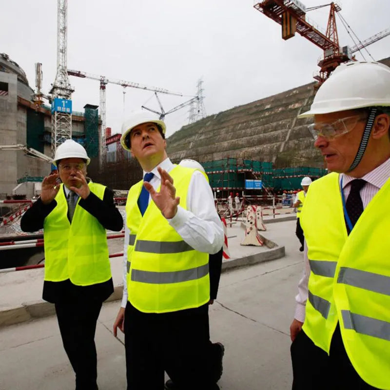 White construction protective helmet, worn by worker outdoors