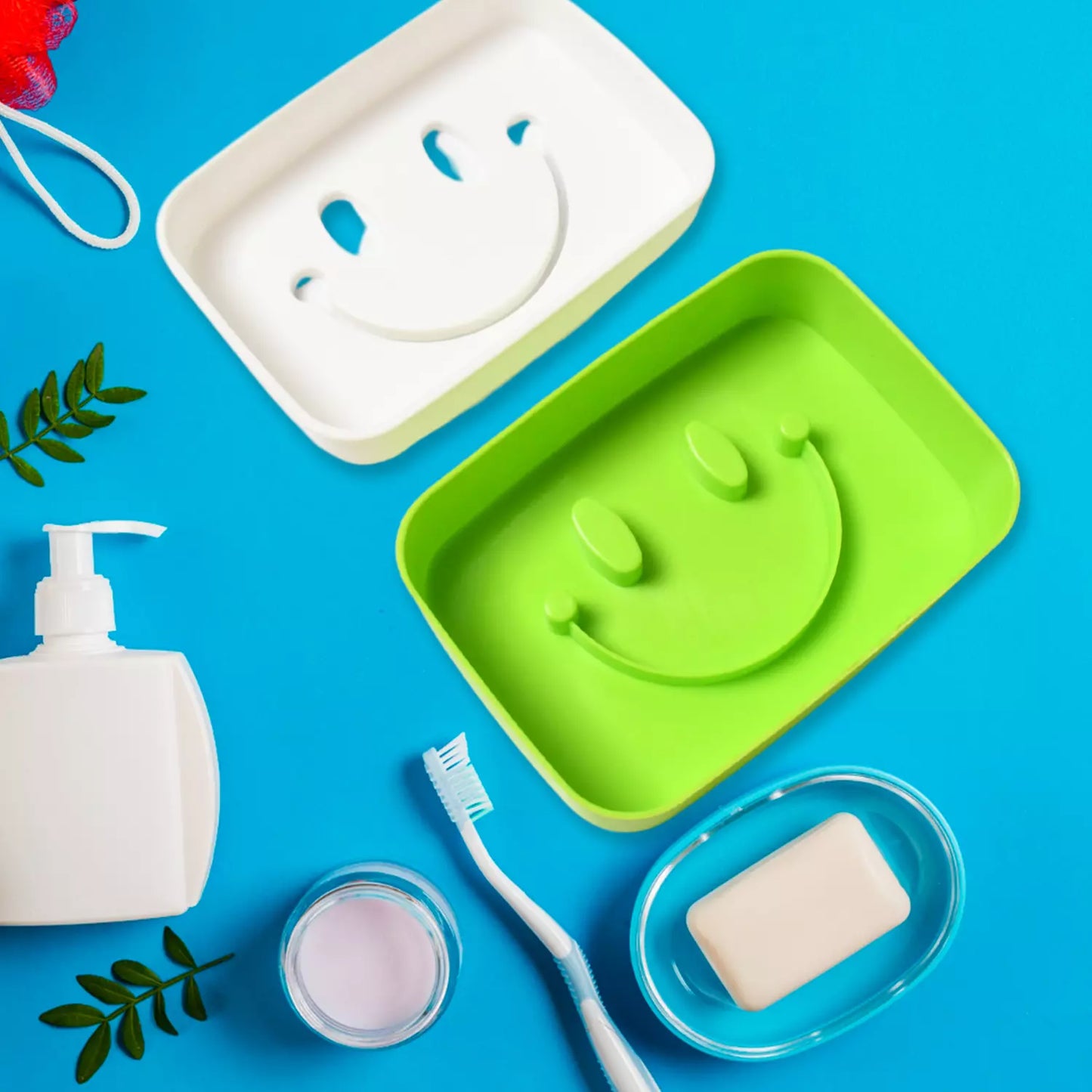 Smiley face travel soap container with green molded smile tray