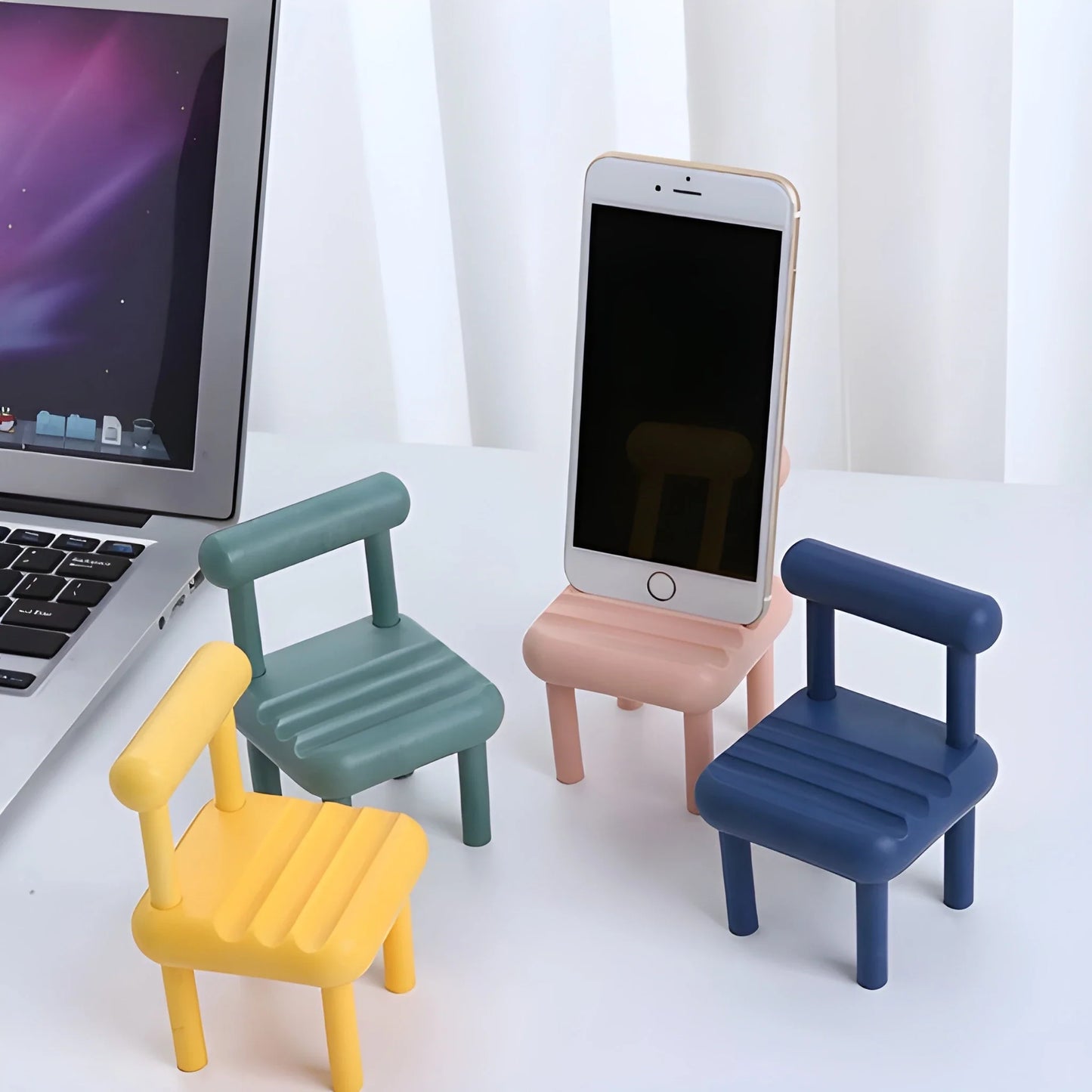 Pastel wooden phone stand set with striped supports in green, pink, and blue