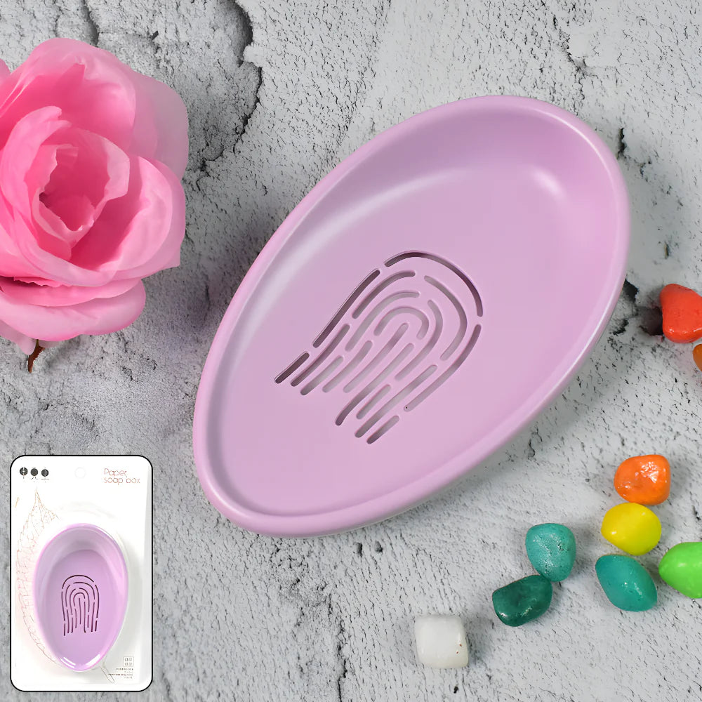 Pink drainable soap holder tray with ridged drainage channel