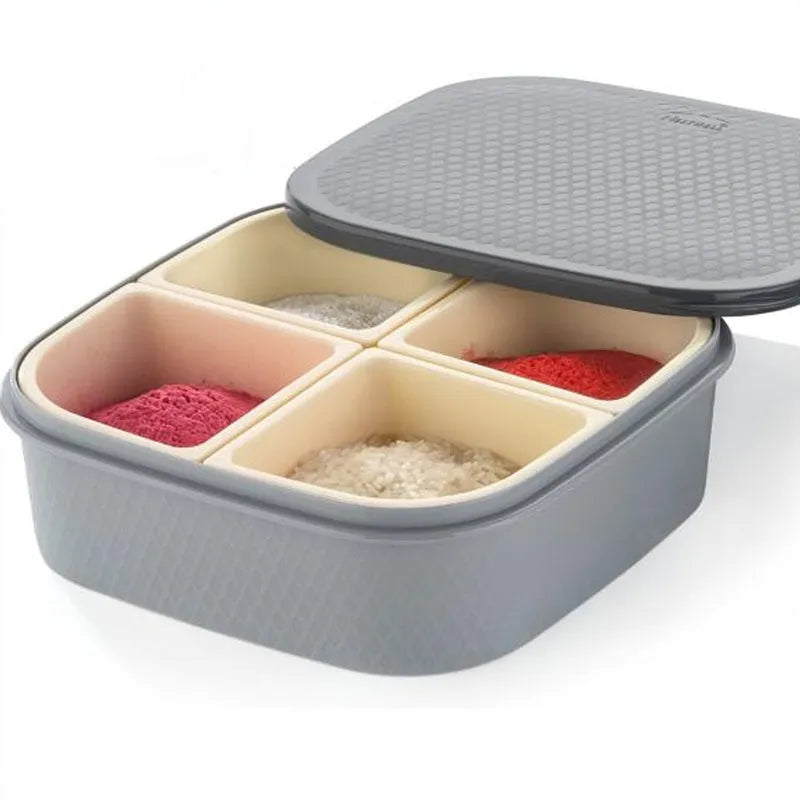 Dry fruit chocolate sweet box, open with four compartments of mixed pieces
