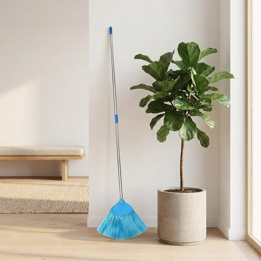 Extendable broom stick with blue brush head and silver telescoping handle