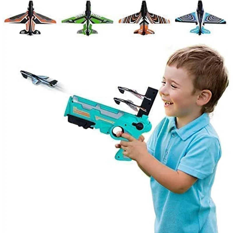 Foam airplane launcher gun in teal with attached foam planes, held by a child