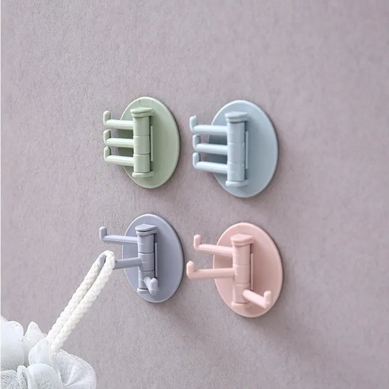 Foldable wall-mount hook set with three rotating hooks and mounting clips
