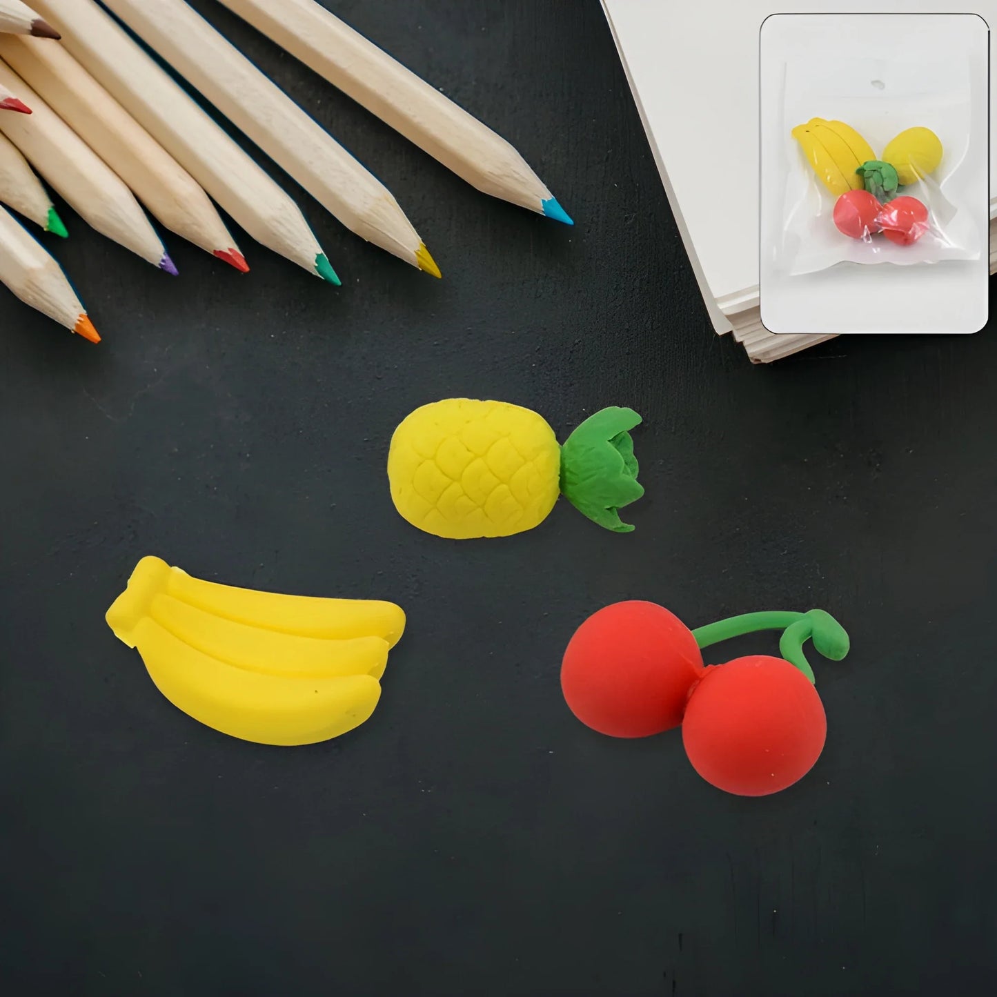3D kids erasers: banana, lemon slice, and cherry shapes, yellow and red