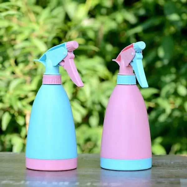 Garden water spray bottle, blue and pink with trigger sprayer and adjustable nozzle.