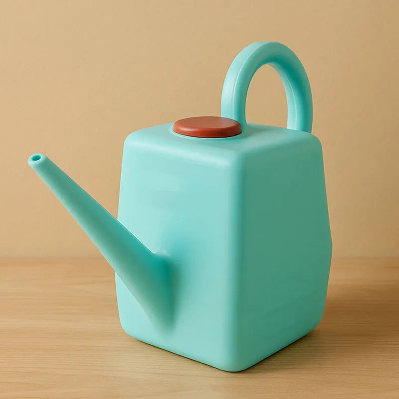 Turquoise gardening watering can with long spout and round orange lid
