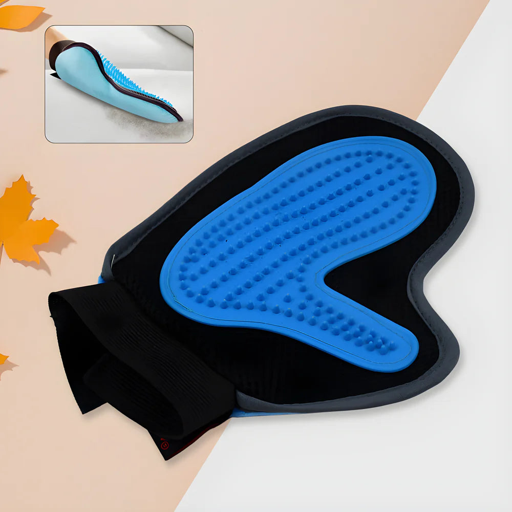 Pet hair glove with blue silicone bristles on black knit hand