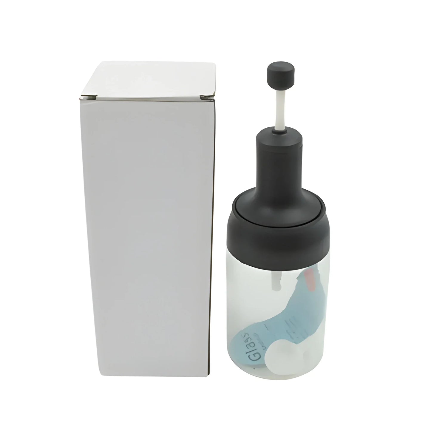 Glass spice dispenser jar with black pump and clear refill container