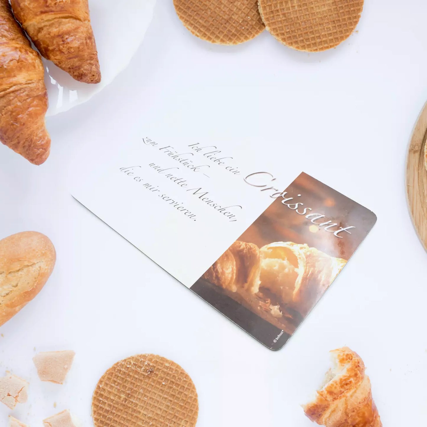 Hybrid cutting board with rounded edge and printed recipe and bread image