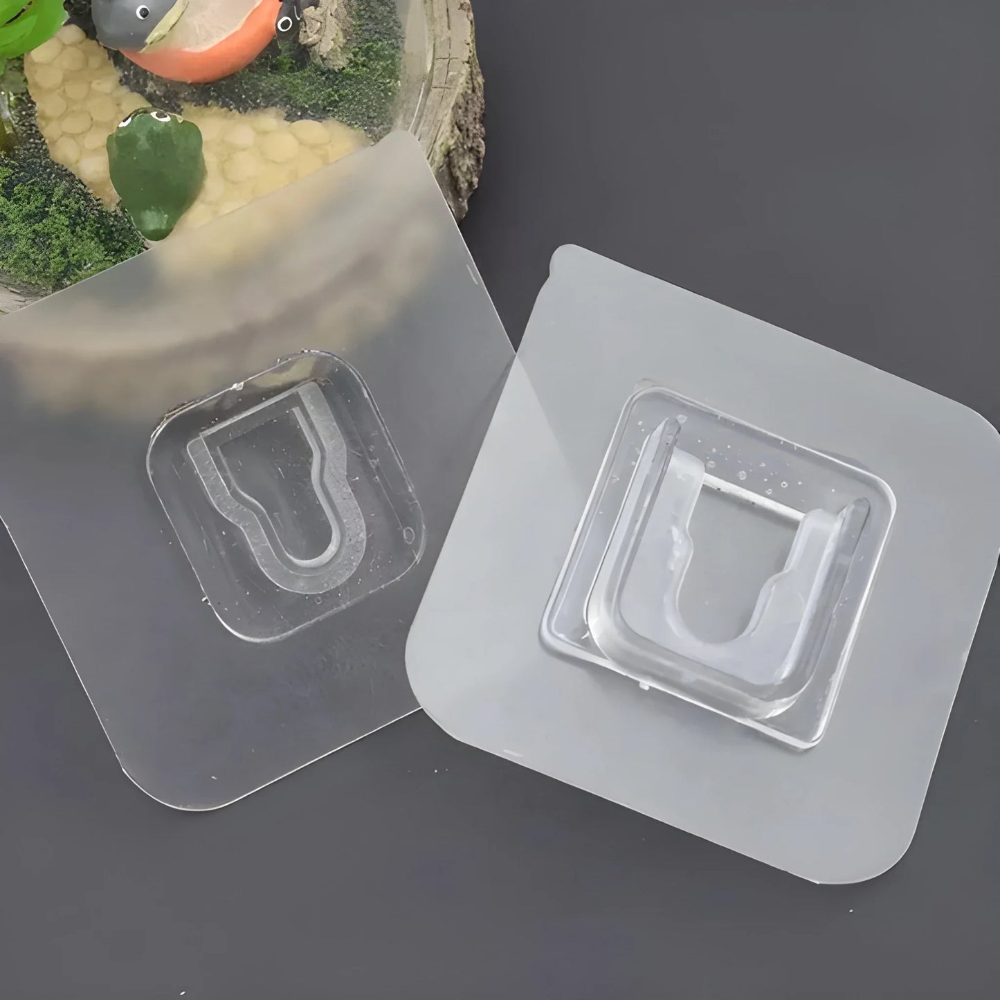 Transparent U-shaped adhesive stickers in clear plastic packaging