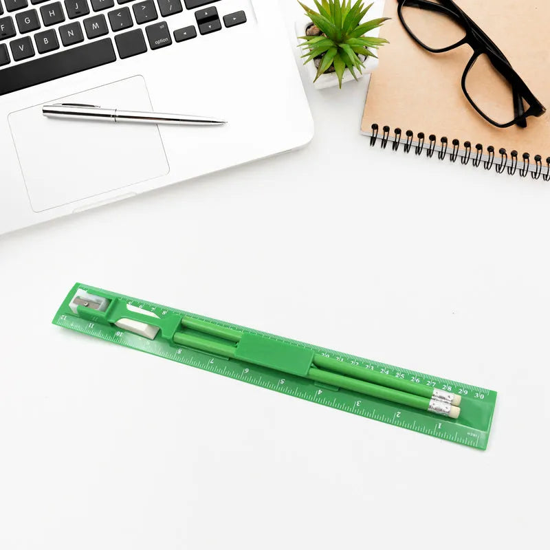 Green kids ruler with measurement markings and white scale insert