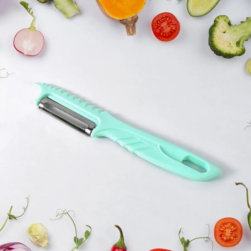 Mint green vegetable peeler with stainless steel blade and safety cover