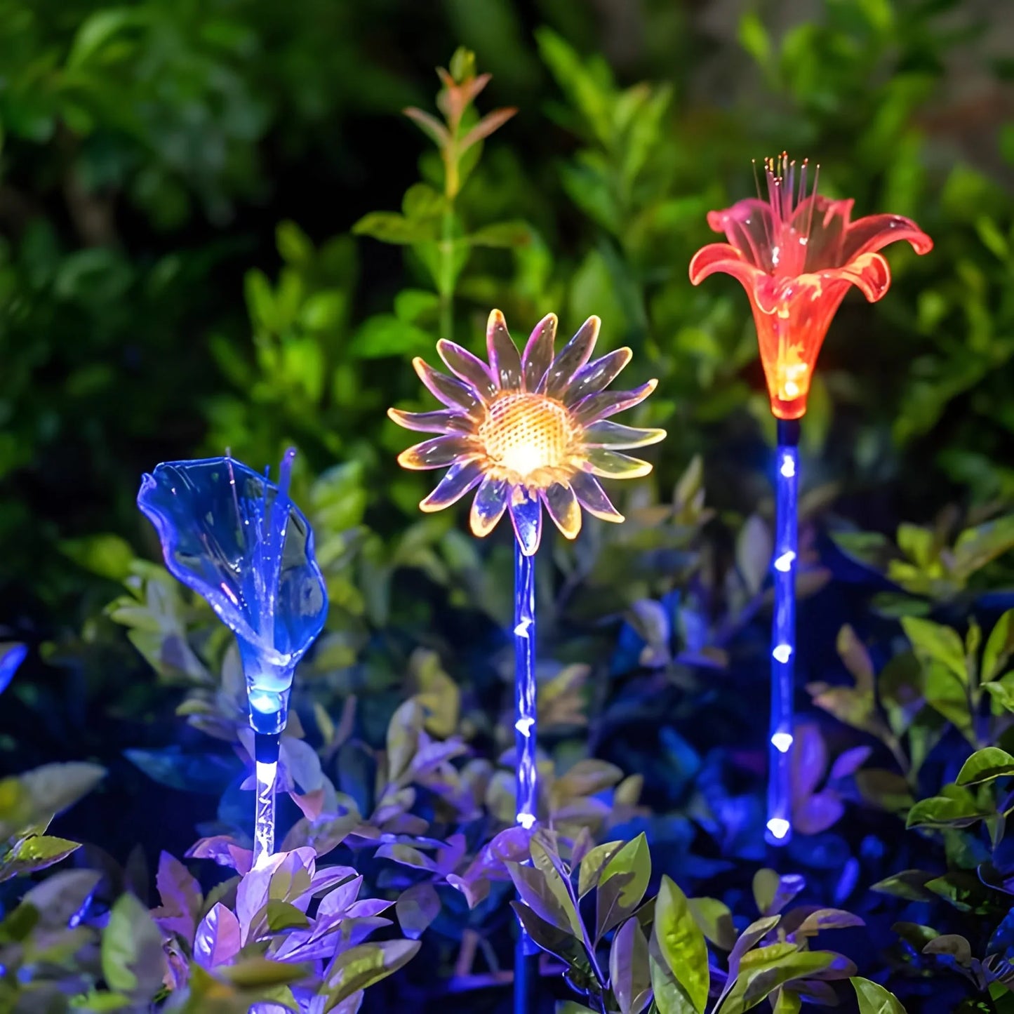 LED candle decoration lights with blue and purple flame tips on garden stems