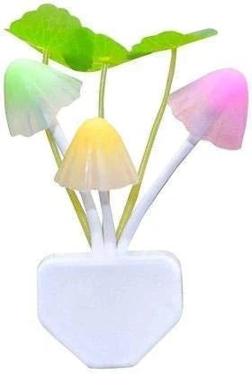 LED mushroom night light with translucent glowing shades on a white base