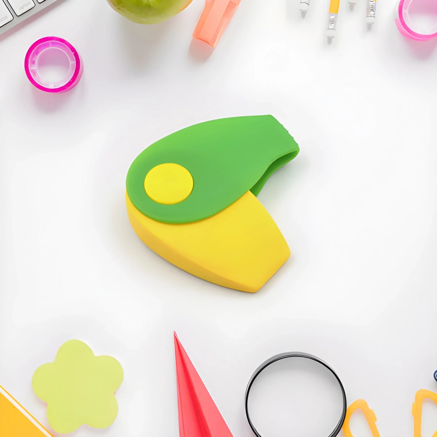 Two-tone green and yellow spinner eraser, rounded oval shape