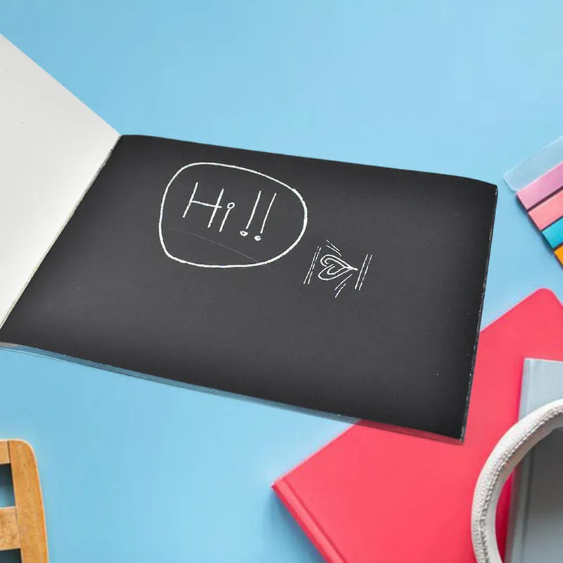 Scratch art book cover, black with white "Hi!!" doodle