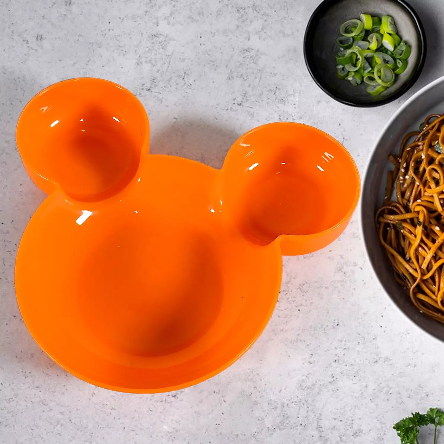 Orange Mickey Mouse-shaped kids plate with two ear sections and center divider.