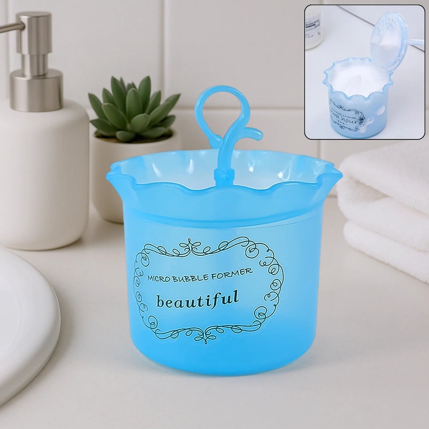 Blue micro bubble facial foamer cup with spout and handle, textured relief label