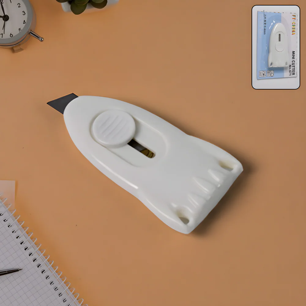 Mini cloud utility cutter with retractable blade in white plastic housing