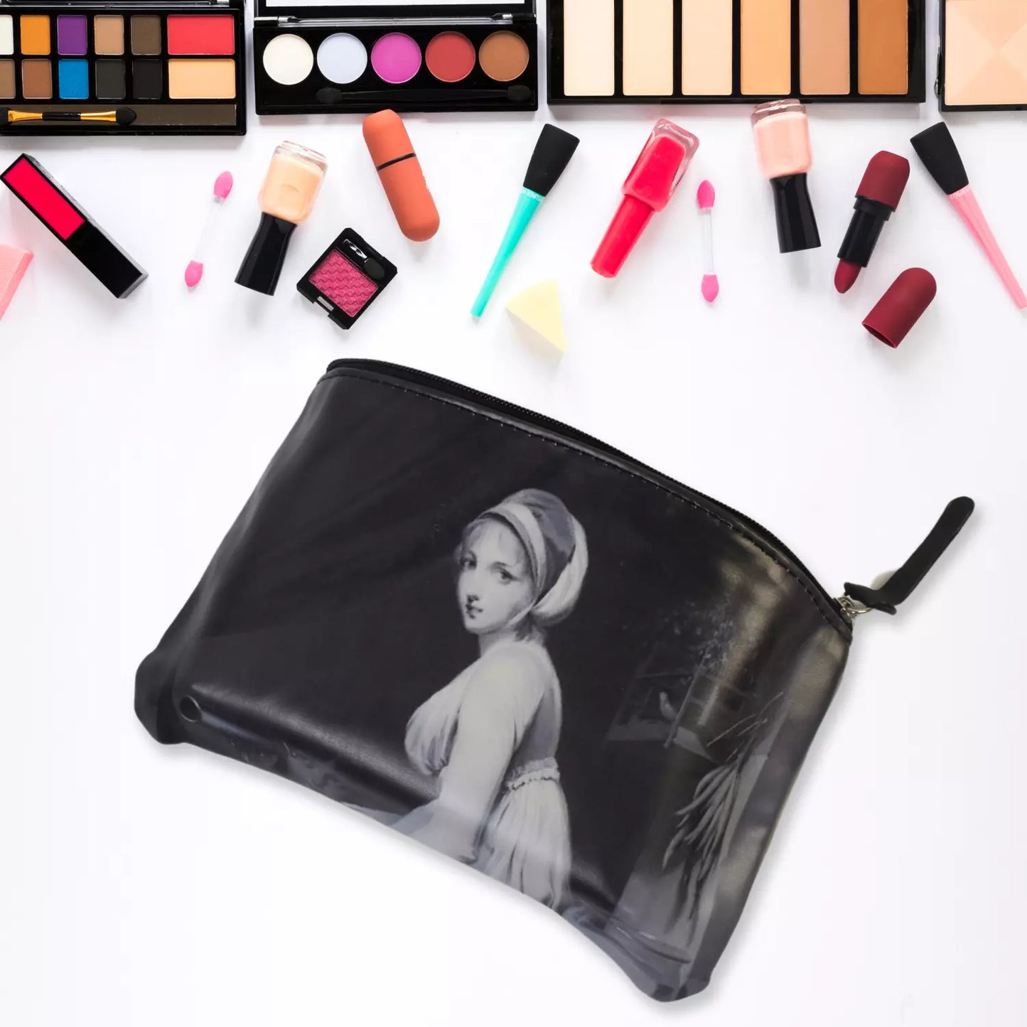 Multi-purpose storage pouch, black fabric with grayscale face graphic and zipper closure