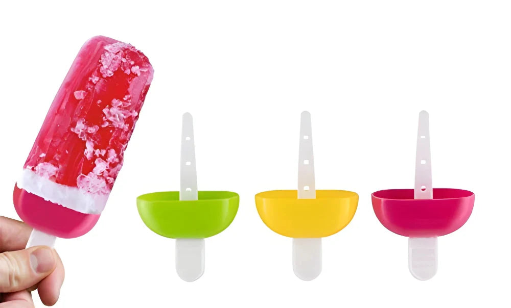 Multicolor kulfi ice mold set with sticks; pink frozen mold in hand