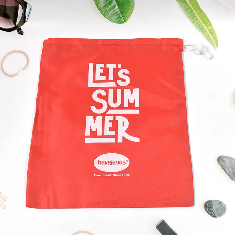 Red heavy duty drawstring bag with white LET'S SUM MER text