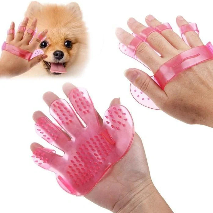 Pet grooming glove brush with pink rubber bristles on a hand