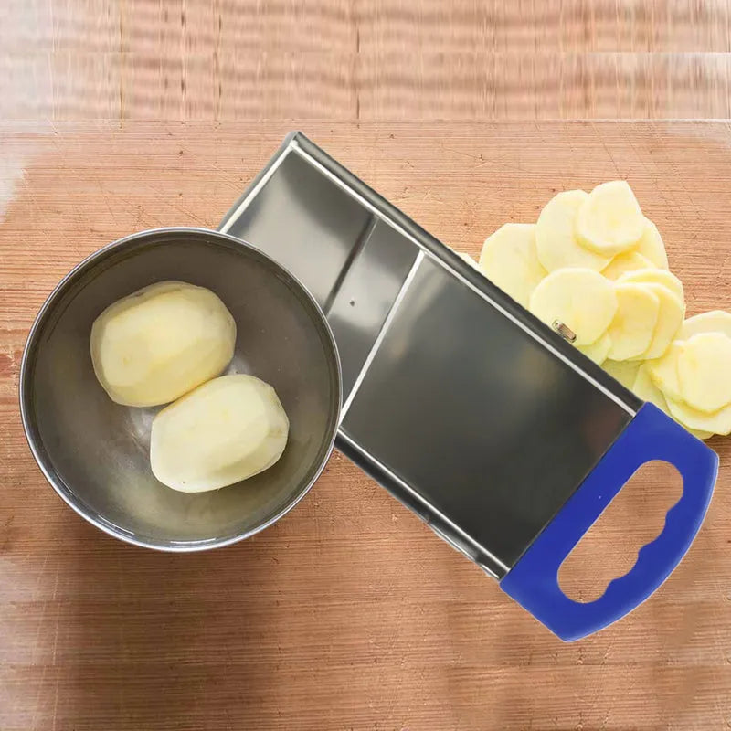 Potato slicer with bowl and blade, holding pale potato slices