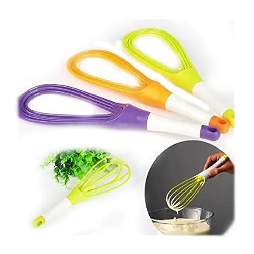 Plastic balloon whisk with looped wire, white handle, in green, yellow, and purple