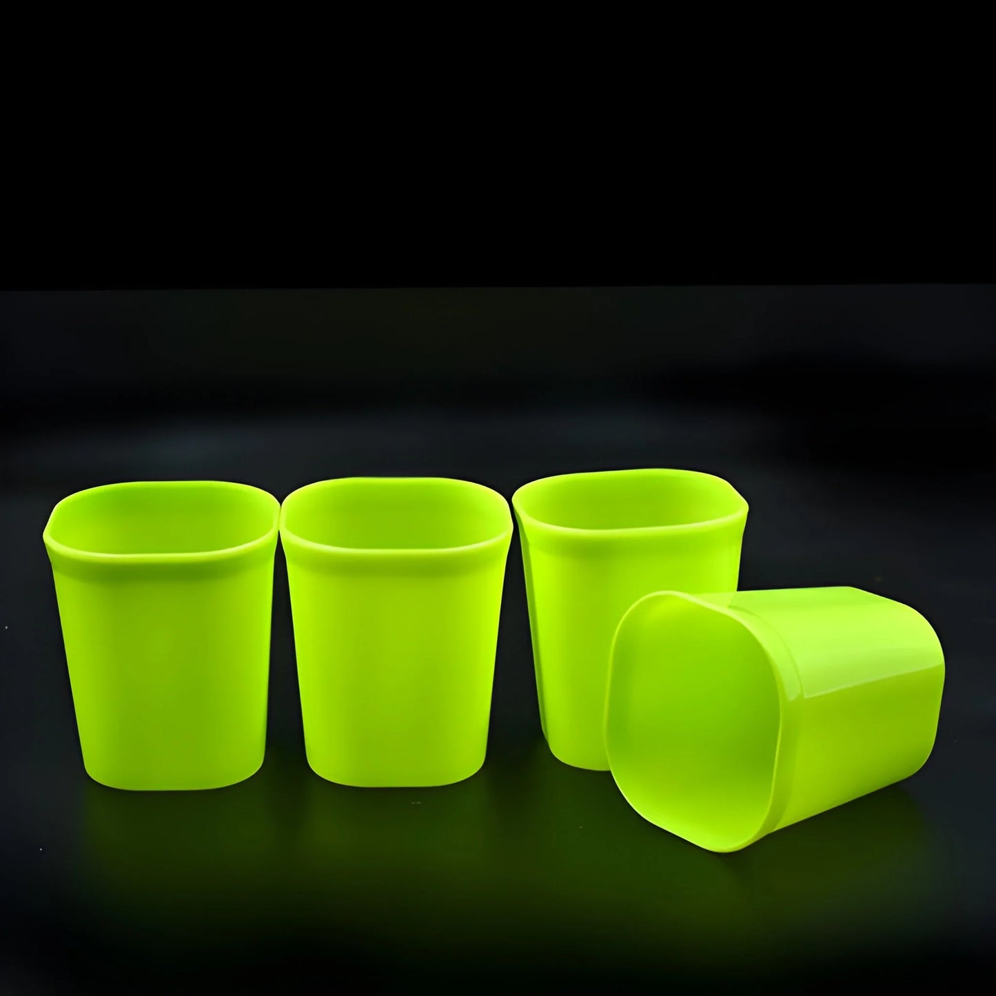 Neon green plastic drinking glasses set, translucent cups with rounded rims