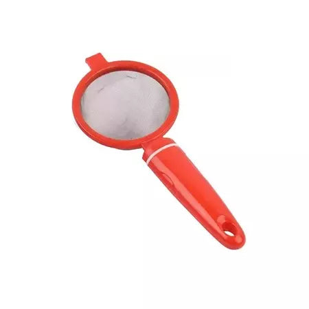 Red plastic tea strainer with round mesh head and long handle