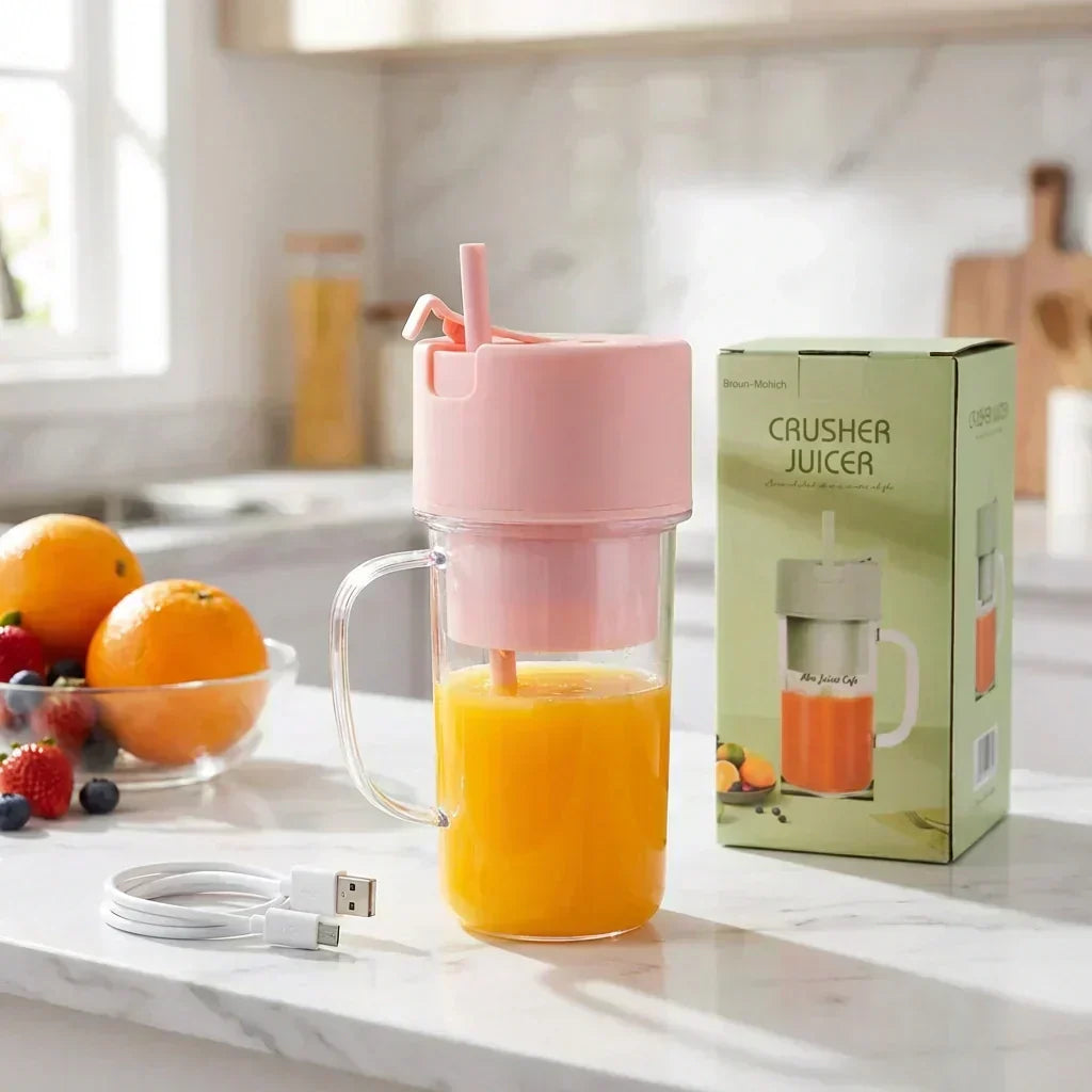 Portable hand juicer with pink crusher top and clear cup, USB charging cable