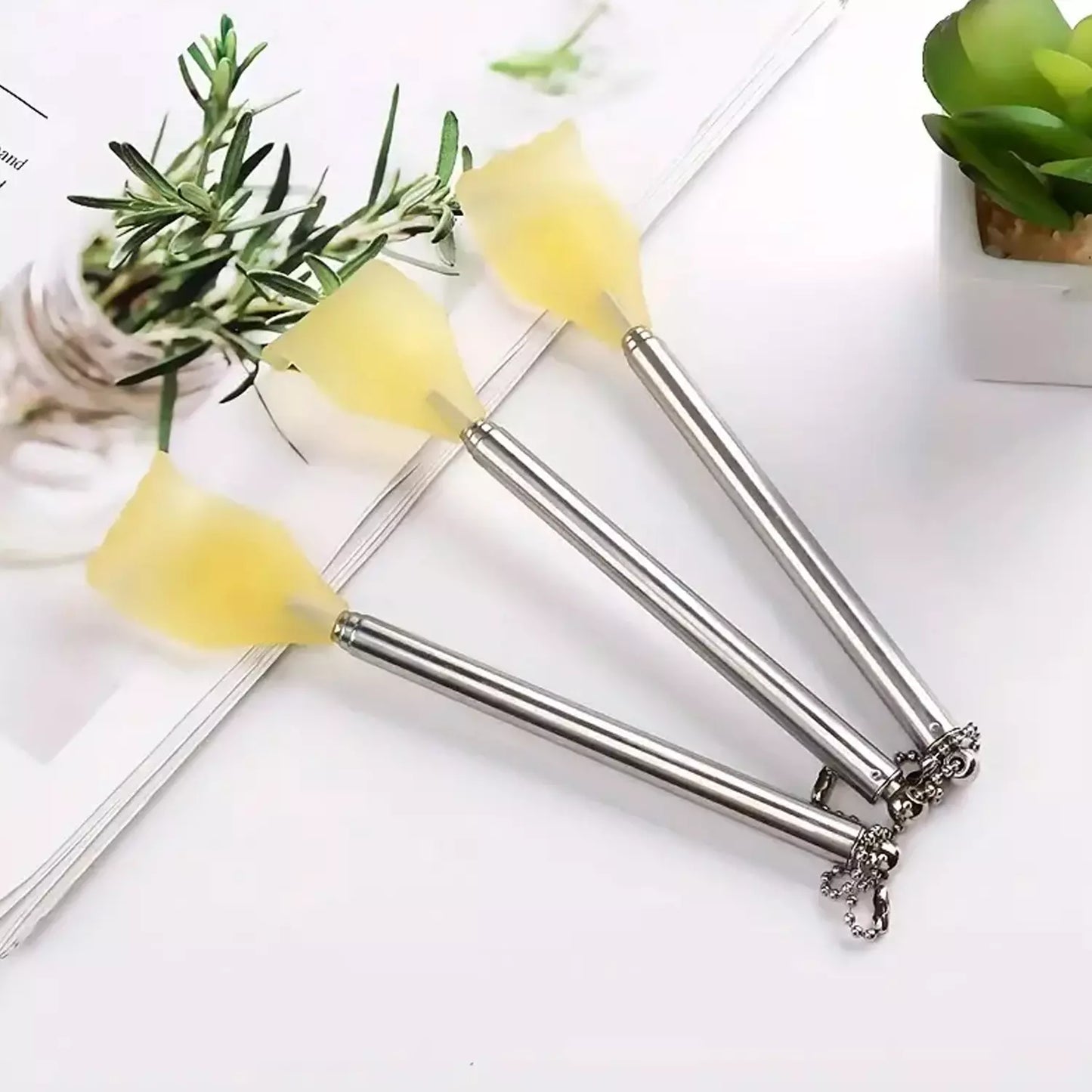 Retractable metal back scratcher, extended telescoping rod with claw tips
