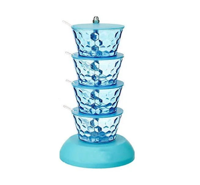 Rotating pickle rack set with four blue condiment cups on a round base