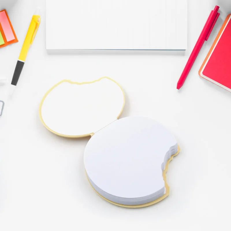 Round biscuits diary notebook with sticky-note style pages, white with yellow edge.