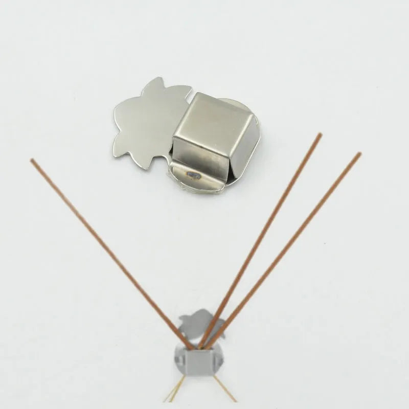 Self-adhesive agarbatti holder with metal clip for incense sticks